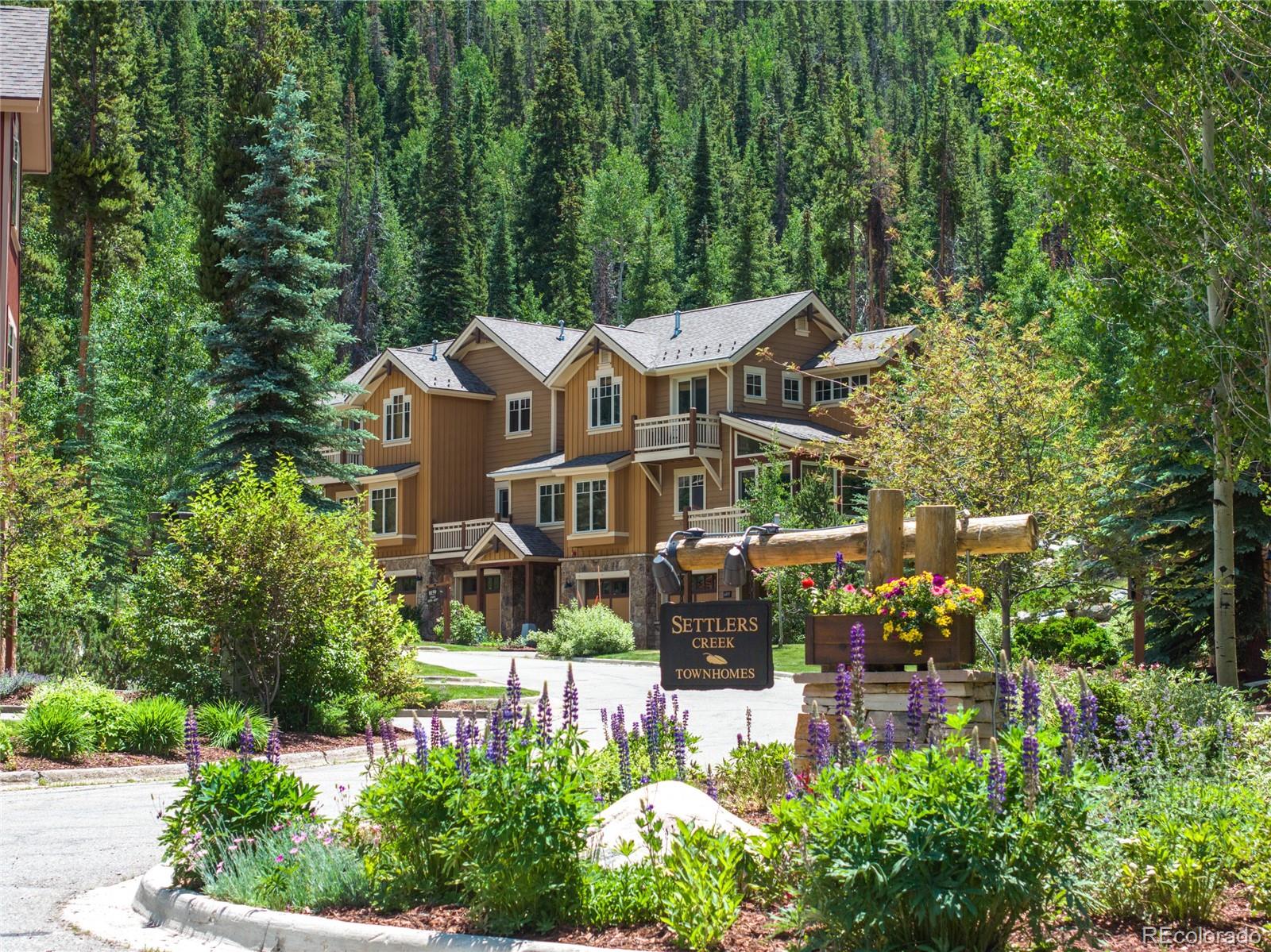 front view of a house with a garden