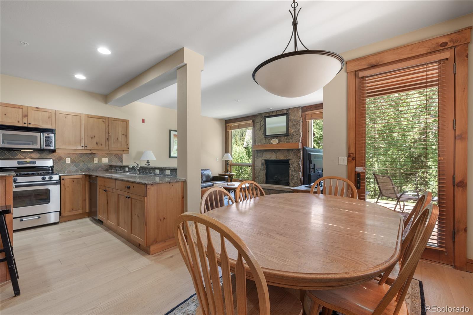 14 Arabella Drive, Unit 6516 Dillon, CO 80435 - Photo 14 of 39 a kitchen with sink a center island and a stove