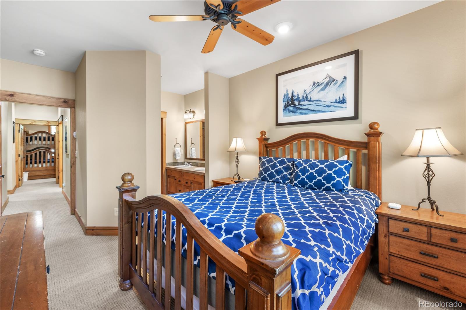 14 Arabella Drive, Unit 6516 Dillon, CO 80435 - Photo 20 of 39 a bedroom with furniture and wooden floor