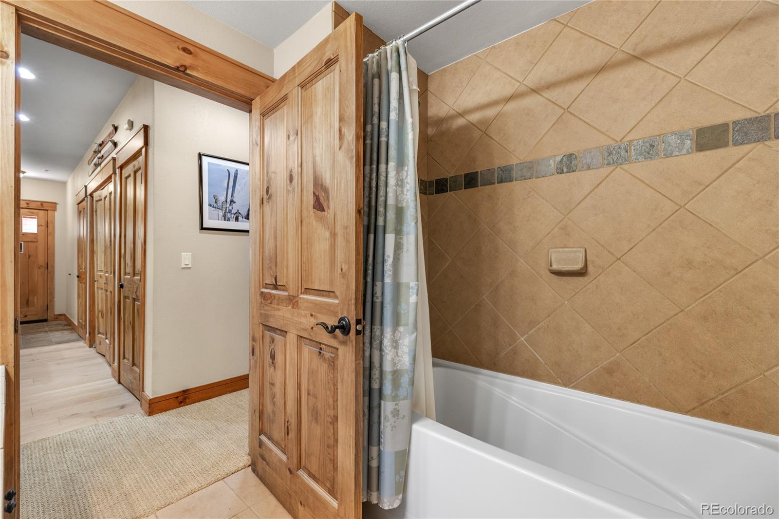 14 Arabella Drive, Unit 6516 Dillon, CO 80435 - Photo 25 of 39 a bathroom with a bathtub and a shower