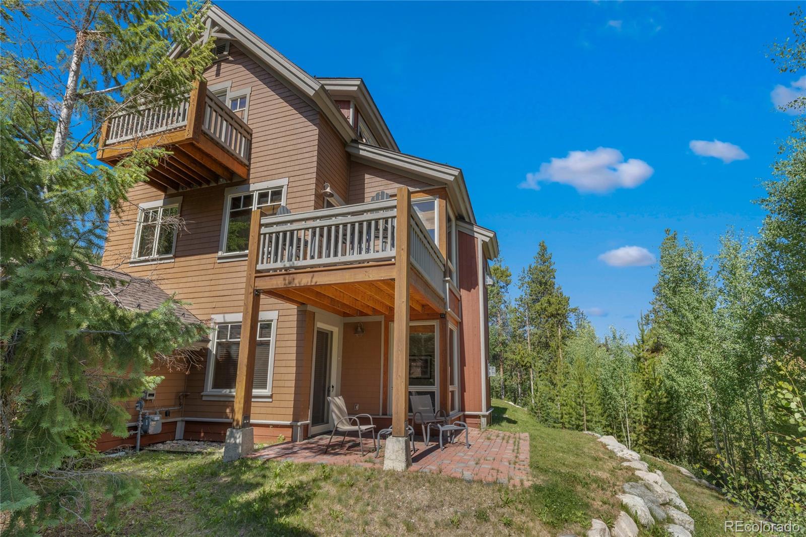 14 Arabella Drive, Unit 6516 Dillon, CO 80435 - Photo 27 of 39 a view of a house with a backyard