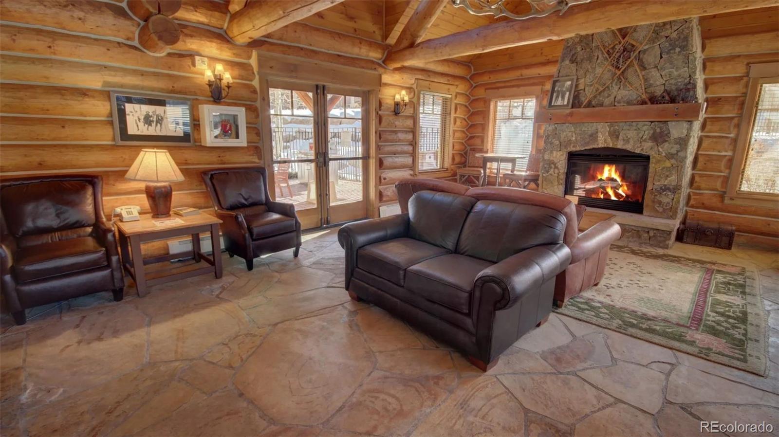 14 Arabella Drive, Unit 6516 Dillon, CO 80435 - Photo 30 of 39 a living room with furniture and a fireplace
