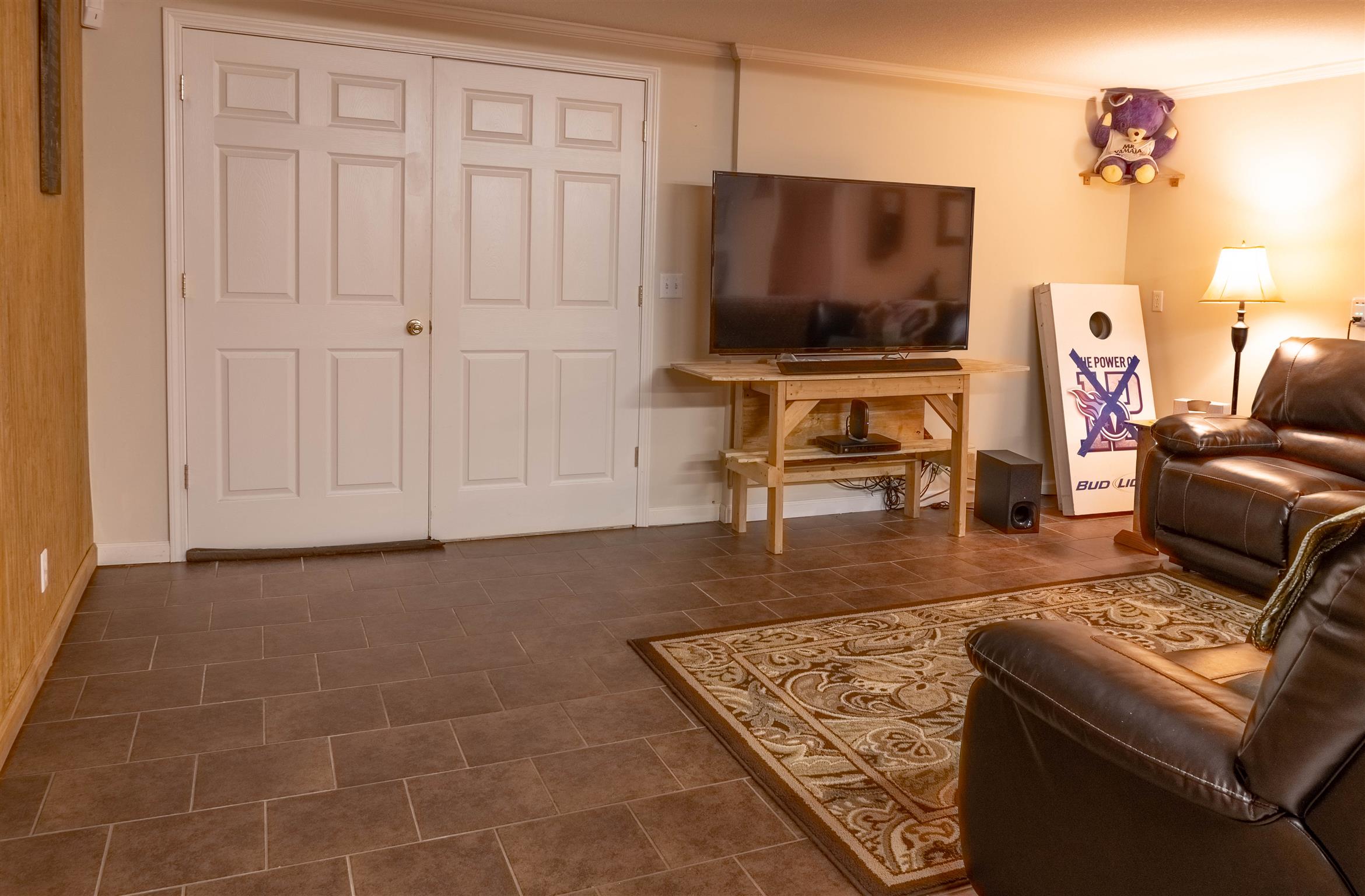 2141 Cunningham Road Cookeville, TN 38506 - Photo 23 of 30 A second living area with doors connected to a two car garage downstairs.
