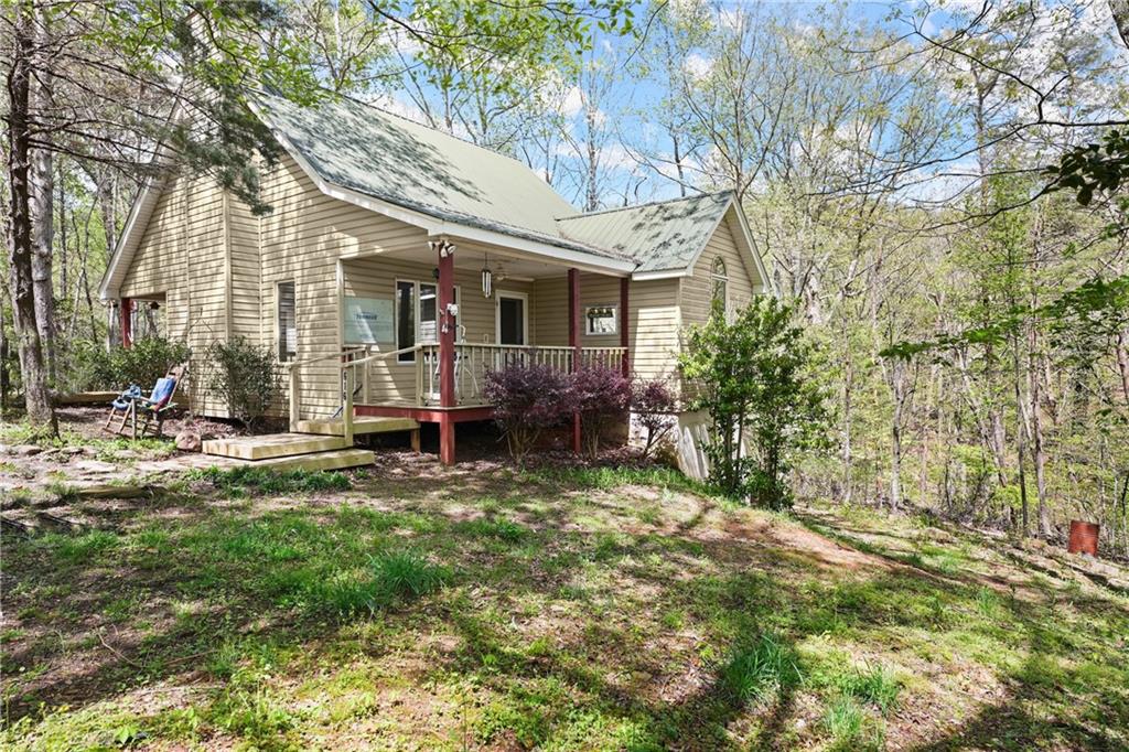 616 Hickory Cove Road Jasper, GA 30143 - Photo 1 of 1 a view of house with yard
