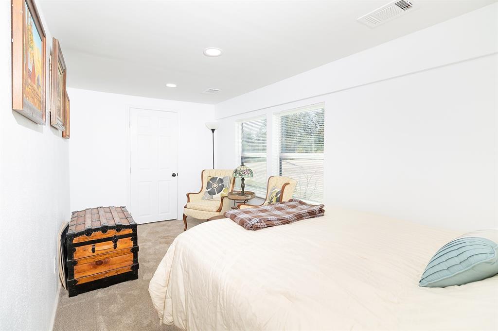 1815 South Oak Street Brady, TX 76825 - Photo 11 of 34 a bedroom with furniture and a window