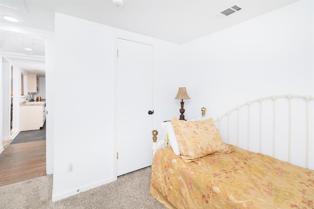 1815 South Oak Street Brady, TX 76825 - Photo 16 of 34 a bed sitting in a bedroom and room