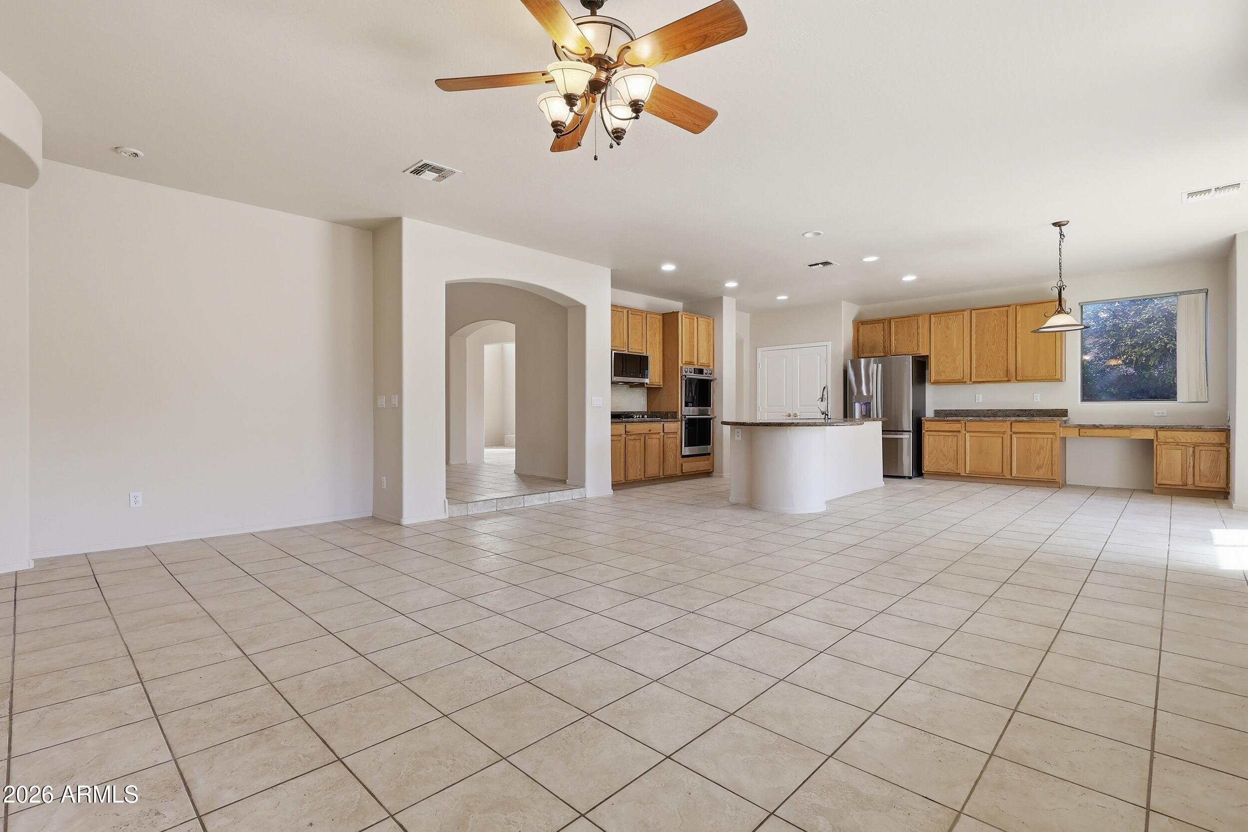 4122 South Clancy Mesa, AZ 85212 - Photo 21 of 70 a view of a kitchen with a refrigerator and a sink