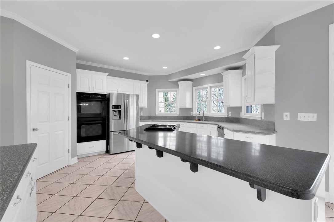 204 Red Maple Way Clemson, SC 29631 - Photo 10 of 48 This spacious kitchen offers ample counter space and modern appliances, perfect for everyday living.