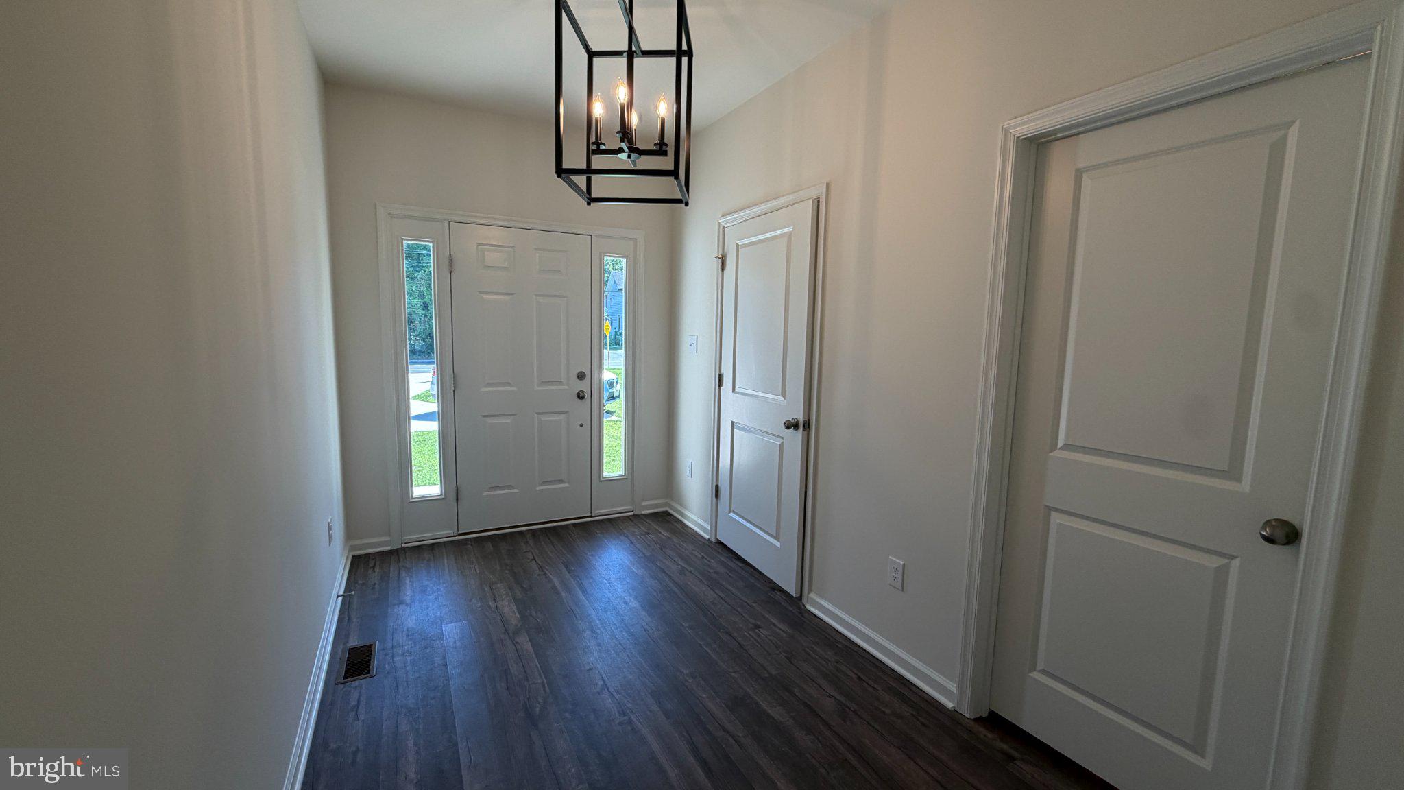 78 Tansboro Road Berlin, NJ 08009 - Photo 3 of 41 a view of empty room with wooden floor