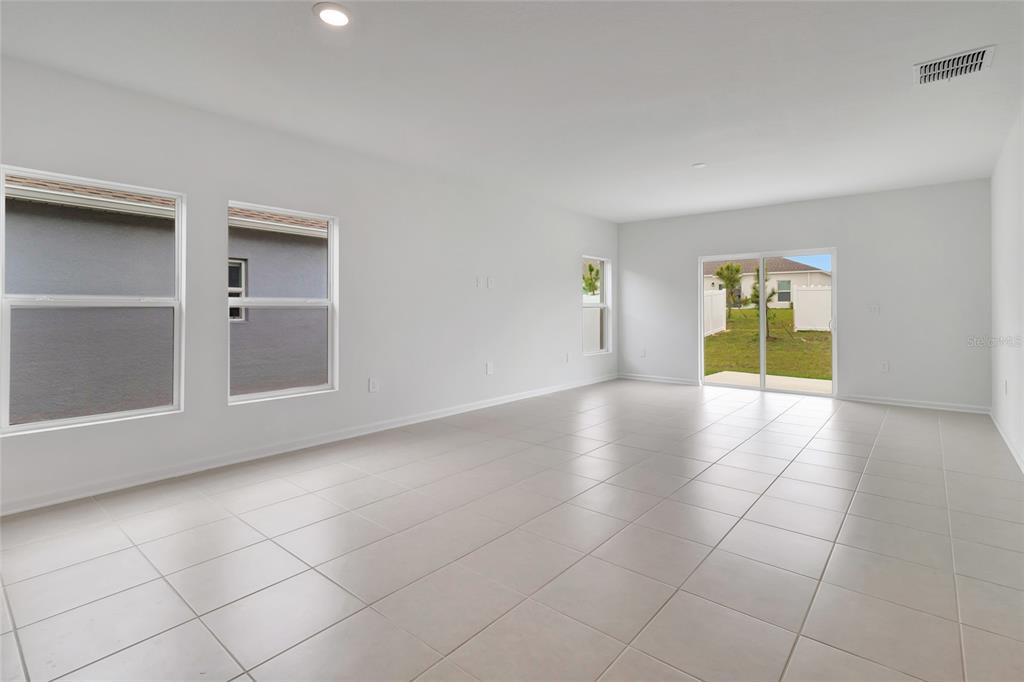 275 Puma Loop Groveland, FL 34736 - Photo 11 of 41 a view of an empty room with a window