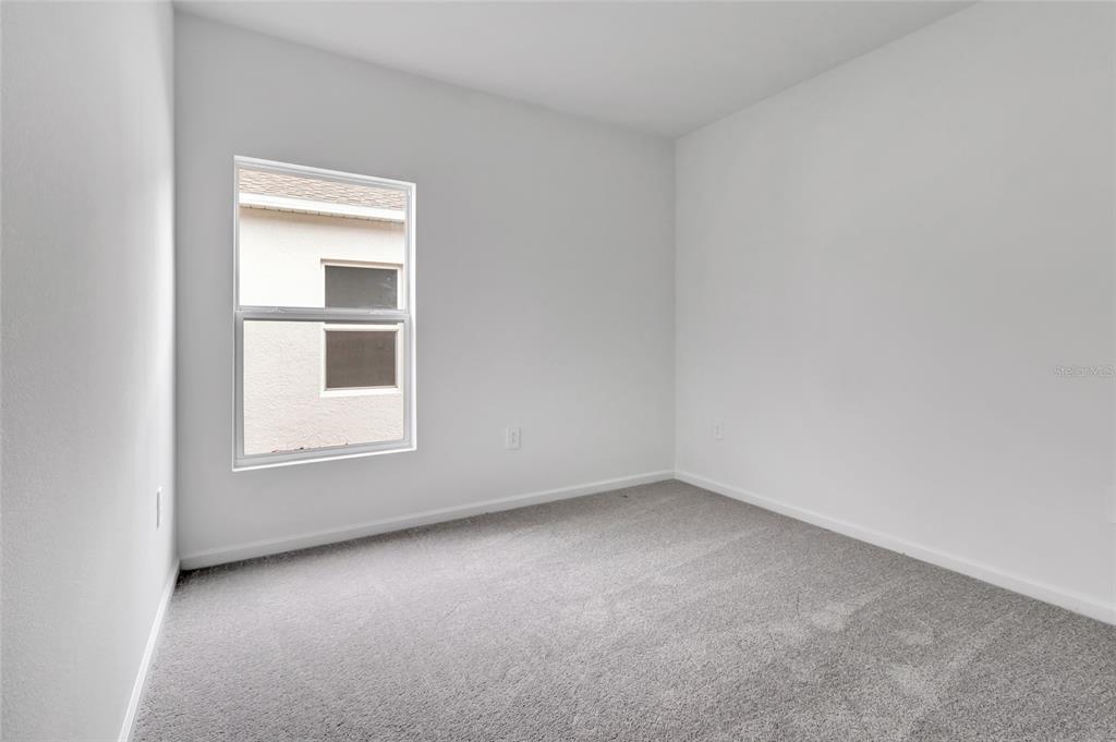 275 Puma Loop Groveland, FL 34736 - Photo 23 of 41 a view of empty room with window