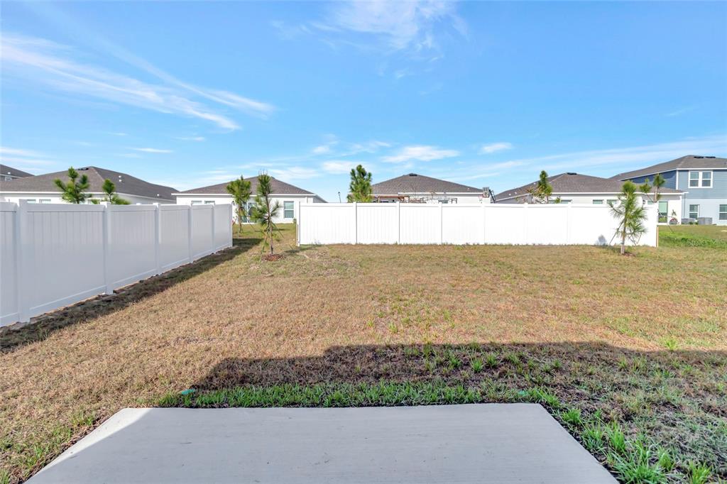 275 Puma Loop Groveland, FL 34736 - Photo 33 of 41 a view of a yard and ocean view