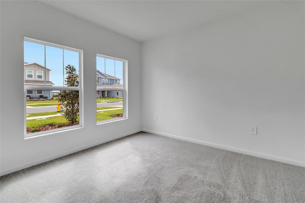 275 Puma Loop Groveland, FL 34736 - Photo 5 of 41 a view of an empty room and window