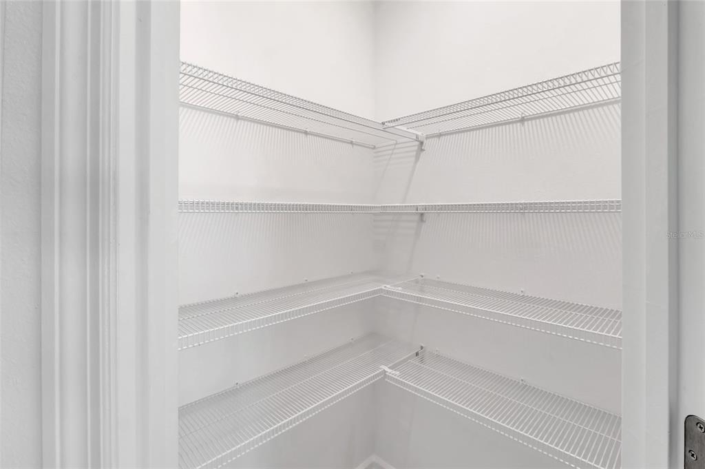 275 Puma Loop Groveland, FL 34736 - Photo 10 of 41 a empty closet with white paint
