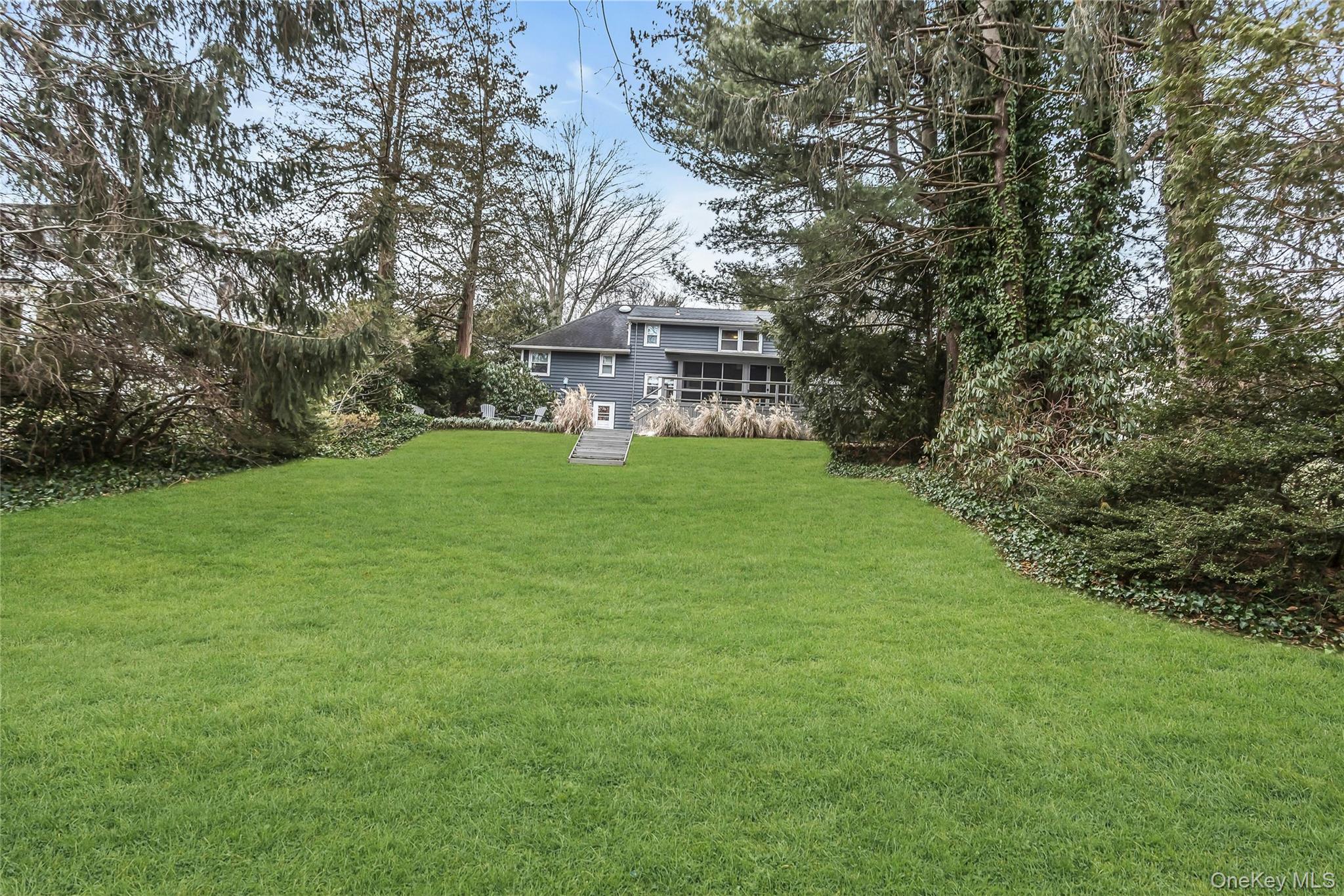 16 Cliff Way Port Washington, NY 11050 - Photo 1 of 1 a view of a house with a yard