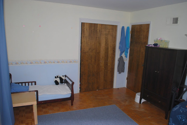 1318 Hickory Road Homewood, IL 60430 - Photo 17 of 21 a bedroom with a bed and wooden floor