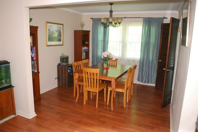 1318 Hickory Road Homewood, IL 60430 - Photo 5 of 21 a dining room with furniture window wooden floor