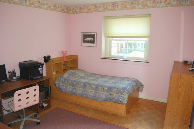 1318 Hickory Road Homewood, IL 60430 - Photo 10 of 21 a bedroom with a bed and a window