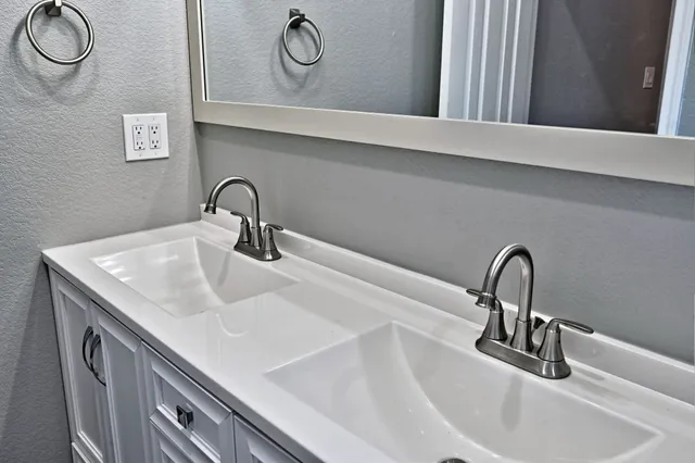 a view of a bathroom from the hallway