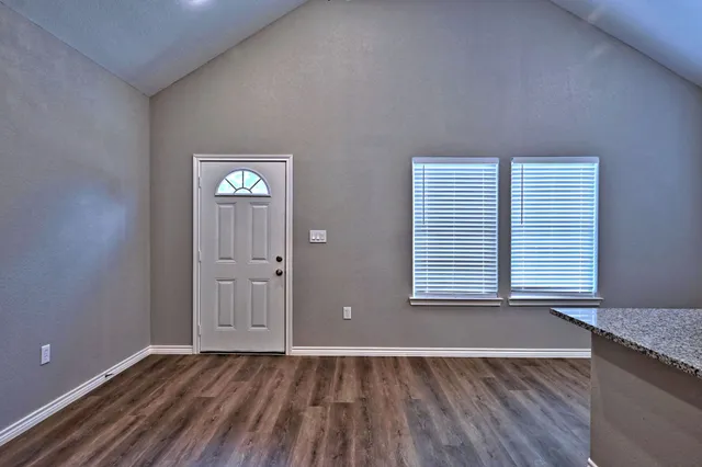 a view of a house with a swimming pool