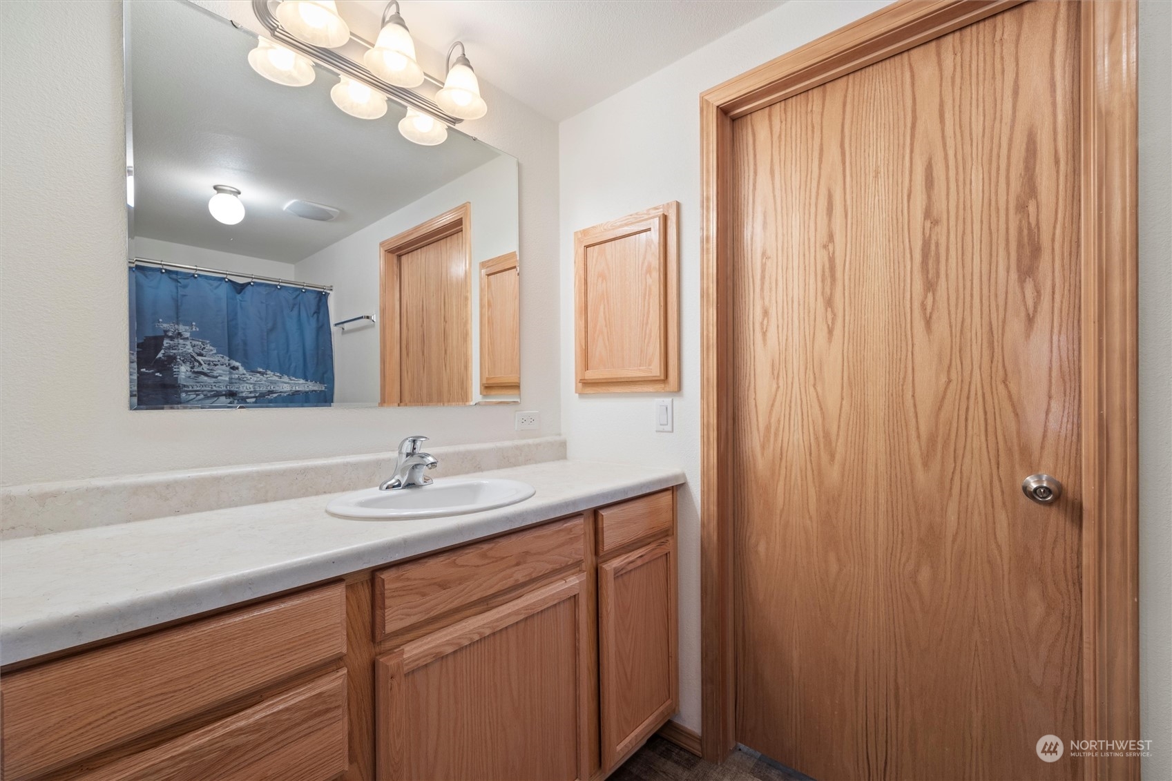 85 Second Street Touchet, WA 99360 - Photo 19 of 28 a bathroom with a sink and a mirror