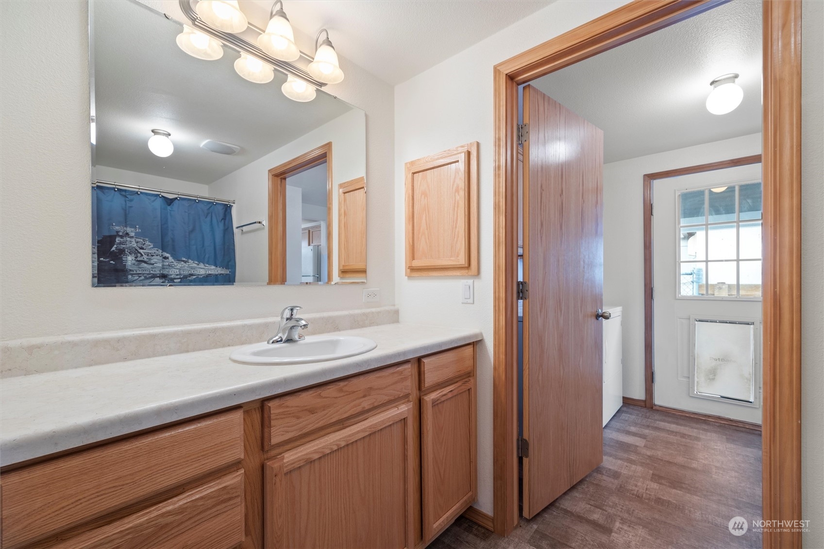 85 Second Street Touchet, WA 99360 - Photo 20 of 28 a bathroom with a sink a vanity and a mirror