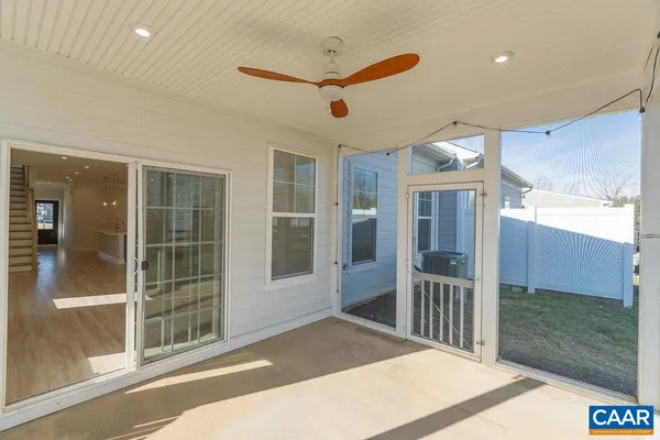 a view of a balcony with chairs