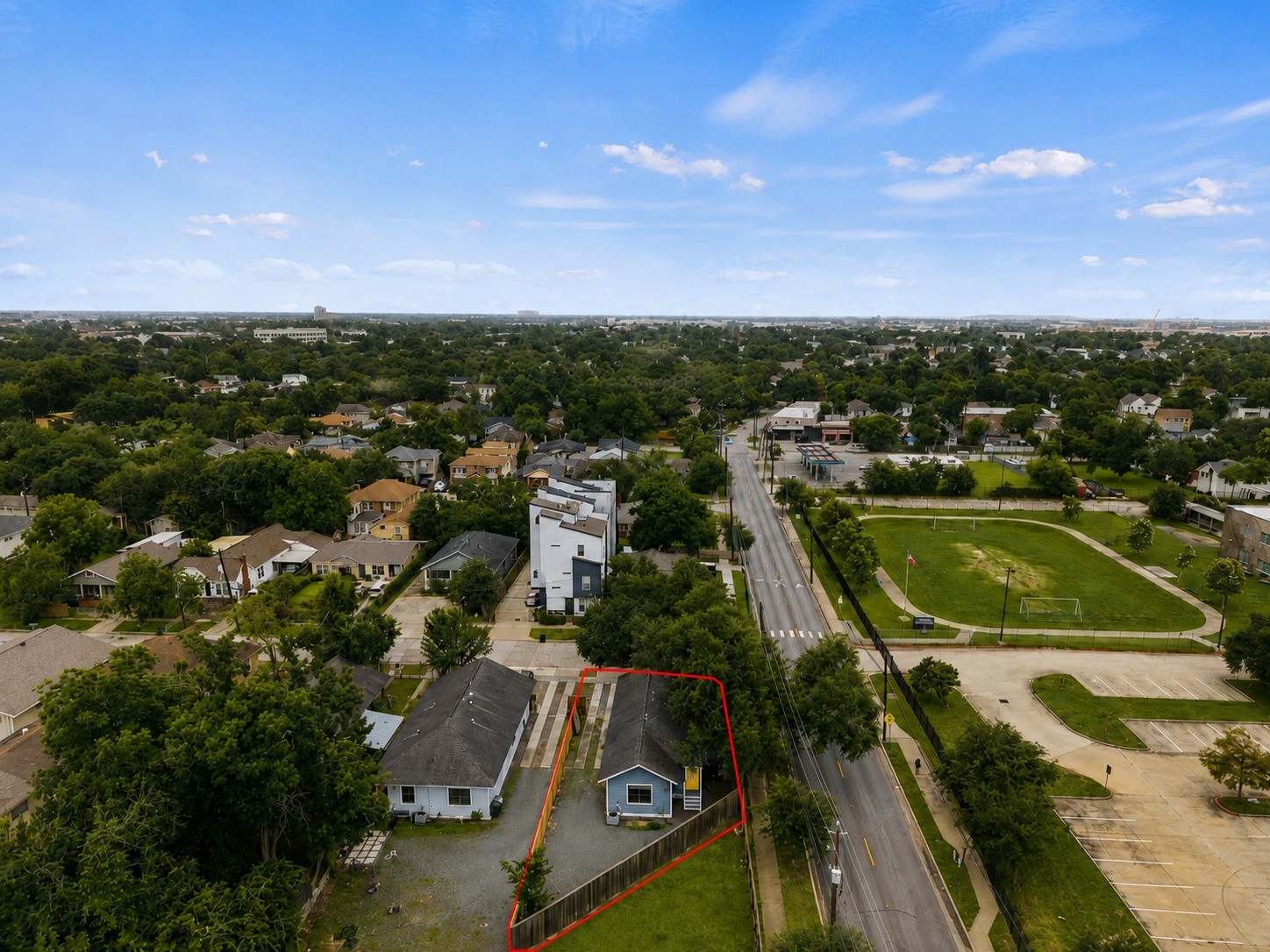 4734 Bell Street, Unit B Houston, TX 77023 - Photo 9 of 10 Aerial view outlining the duplex property, highlighting its close-in Houston setting, surrounding tree canopy, nearby green space, and Bell St frontage.