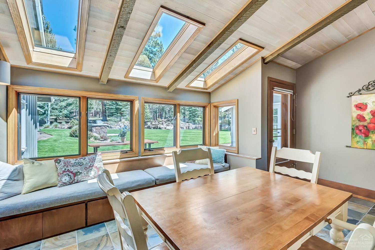69652 Camp Polk Road Sisters, OR 97759 - Photo 10 of 25 Sunroom breakfast nook that opens up to