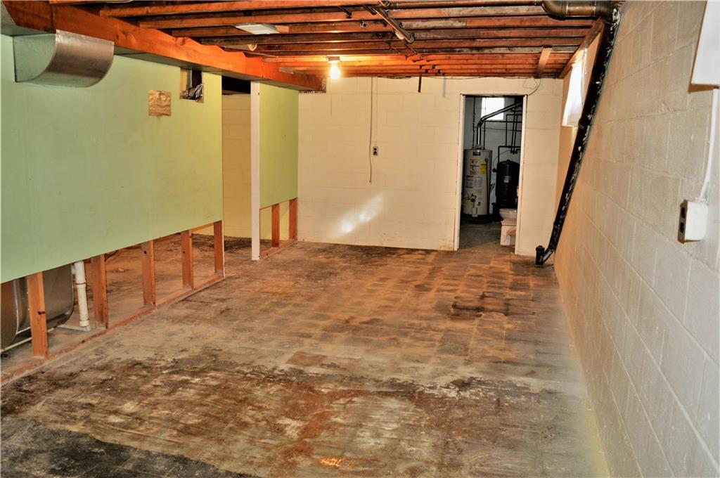 2073 Silverville Road Freeport, PA 16229 - Photo 23 of 25 View in Half of Basement. Open door leads to half bath/utility room.