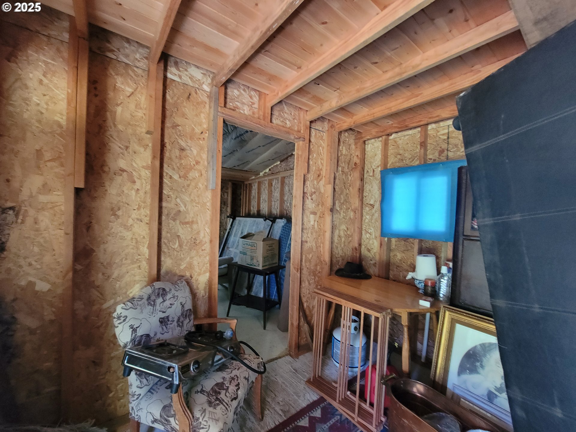 Deady Street Port Orford, OR 97465 - Photo 13 of 17 a living room with furniture and a window