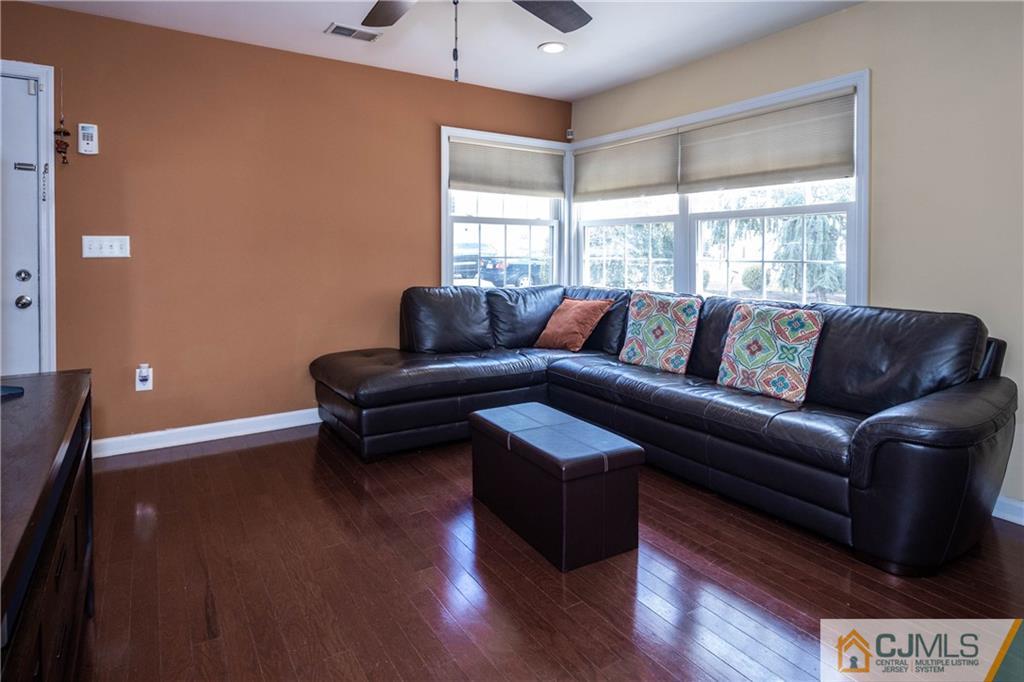 69 Ashley Road Edison, NJ 08817 - Photo 11 of 35 a living room with furniture and a window