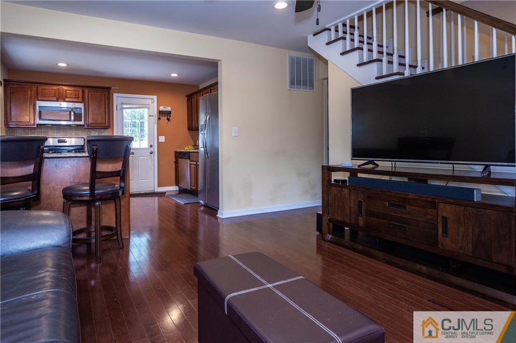 69 Ashley Road Edison, NJ 08817 - Photo 12 of 35 a living room with furniture and a flat screen tv