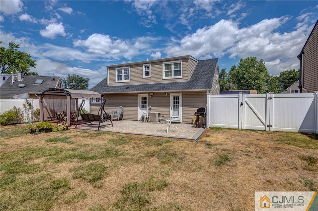 69 Ashley Road Edison, NJ 08817 - Photo 24 of 35 a view of house with yard and sitting area