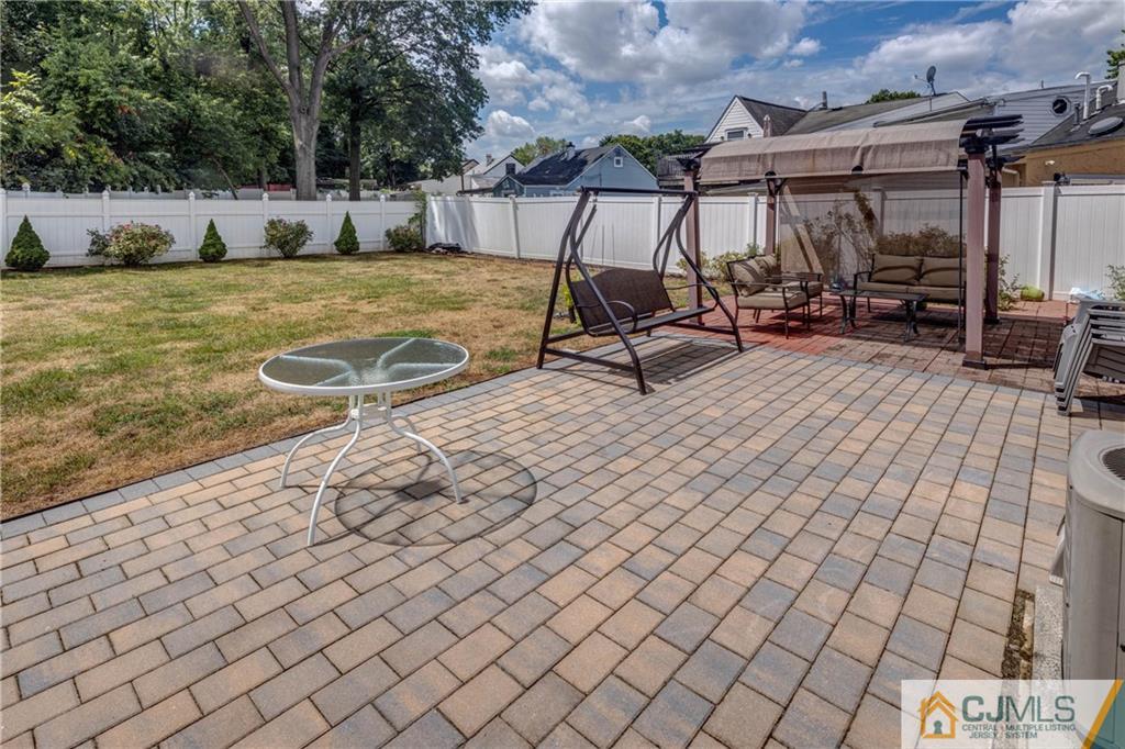 69 Ashley Road Edison, NJ 08817 - Photo 28 of 35 a view of a backyard with swings