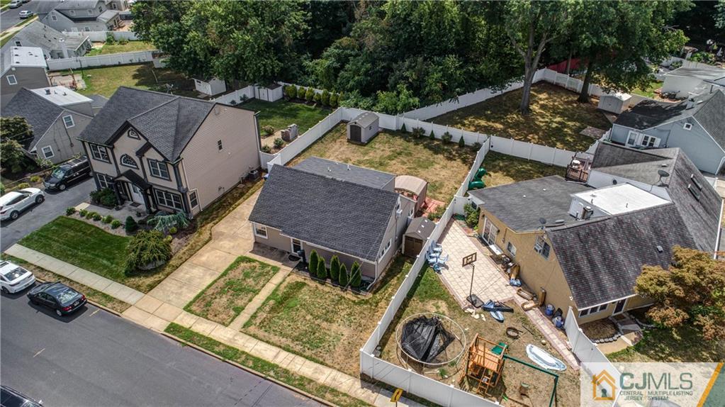 69 Ashley Road Edison, NJ 08817 - Photo 30 of 35 an aerial view of a house with swimming pool and garden