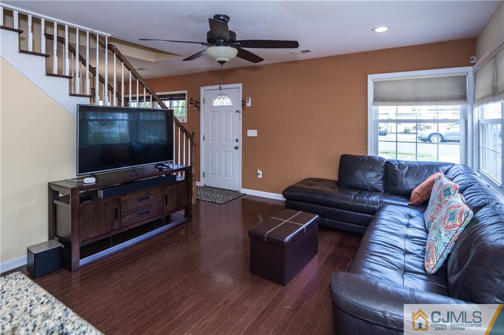 69 Ashley Road Edison, NJ 08817 - Photo 9 of 35 a living room with furniture and a flat screen tv