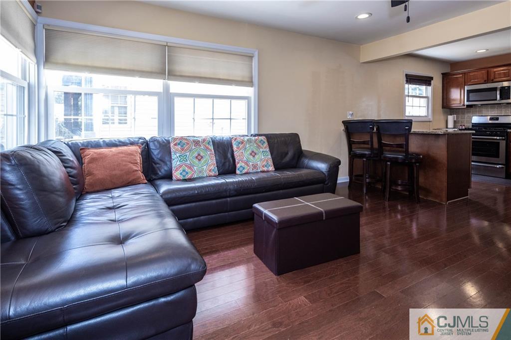 69 Ashley Road Edison, NJ 08817 - Photo 10 of 35 a living room with furniture and a large window