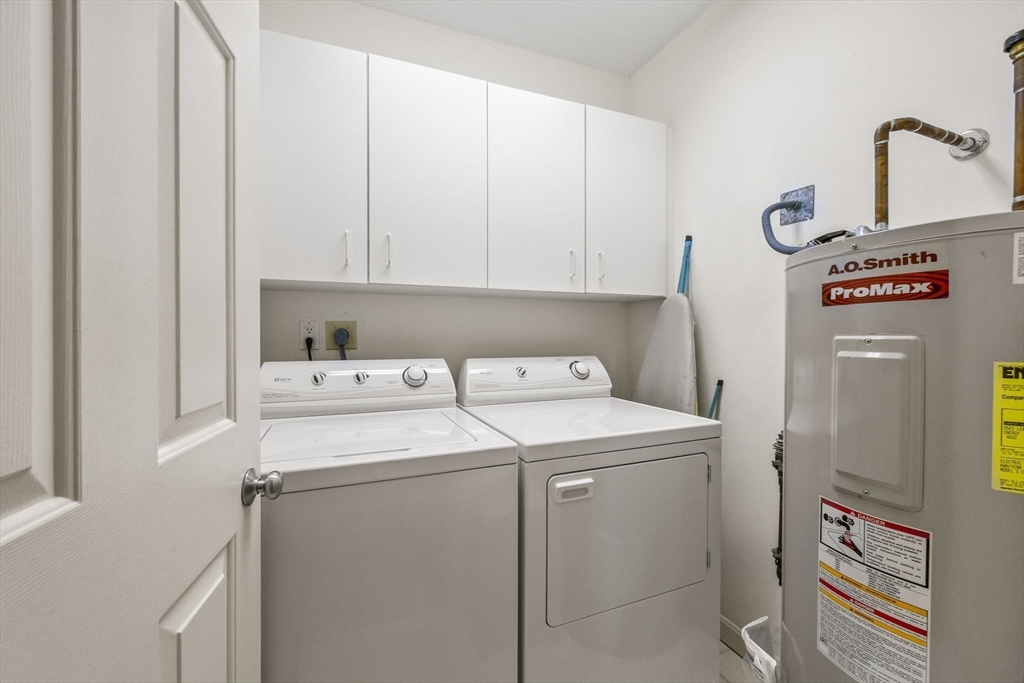 226 Kates Path, Unit 226 Yarmouth, MA 02675 - Photo 21 of 29 a utility room with dryer and washer