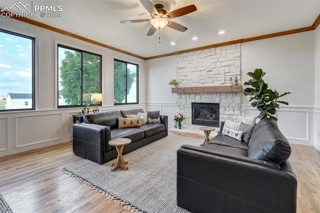 20880 Scott Road Calhan, CO 80808 - Photo 12 of 50 a living room with furniture and a fireplace