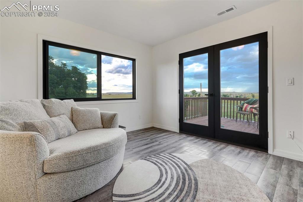 20880 Scott Road Calhan, CO 80808 - Photo 19 of 50 Separate seating area/office space in owner suite with attached deck