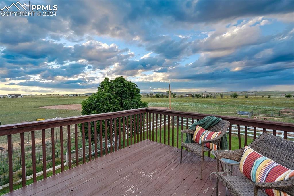 20880 Scott Road Calhan, CO 80808 - Photo 23 of 50 Deck with a rural view and a yard- connected to Owners suite