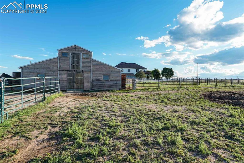 20880 Scott Road Calhan, CO 80808 - Photo 36 of 50 a view of a backyard