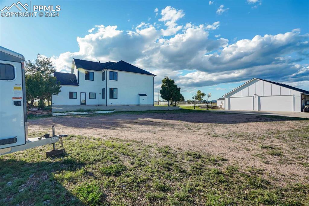 20880 Scott Road Calhan, CO 80808 - Photo 44 of 50 a view of house with yard