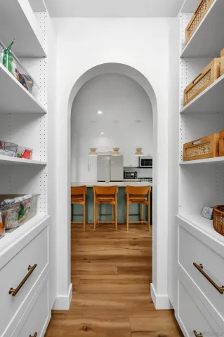 a view of kitchen and cabinets