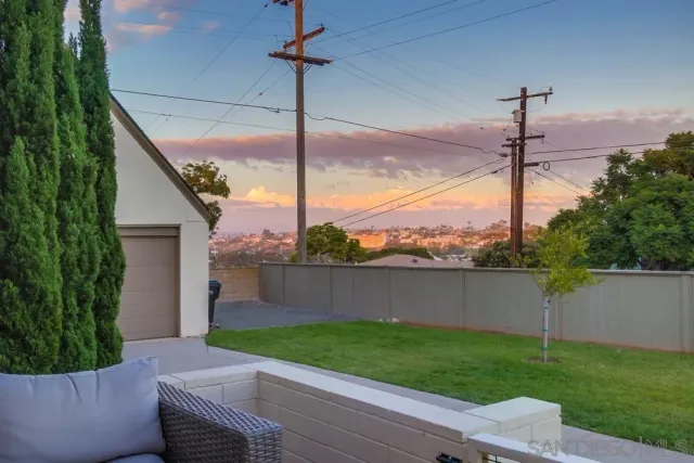 a view of a porch with a fence