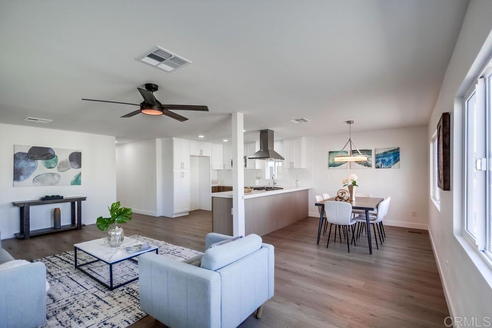 8301 Mission Gorge Road, Unit 208 Santee, CA 92071 - Photo 5 of 22 a view of a dining room with furniture and wooden floor