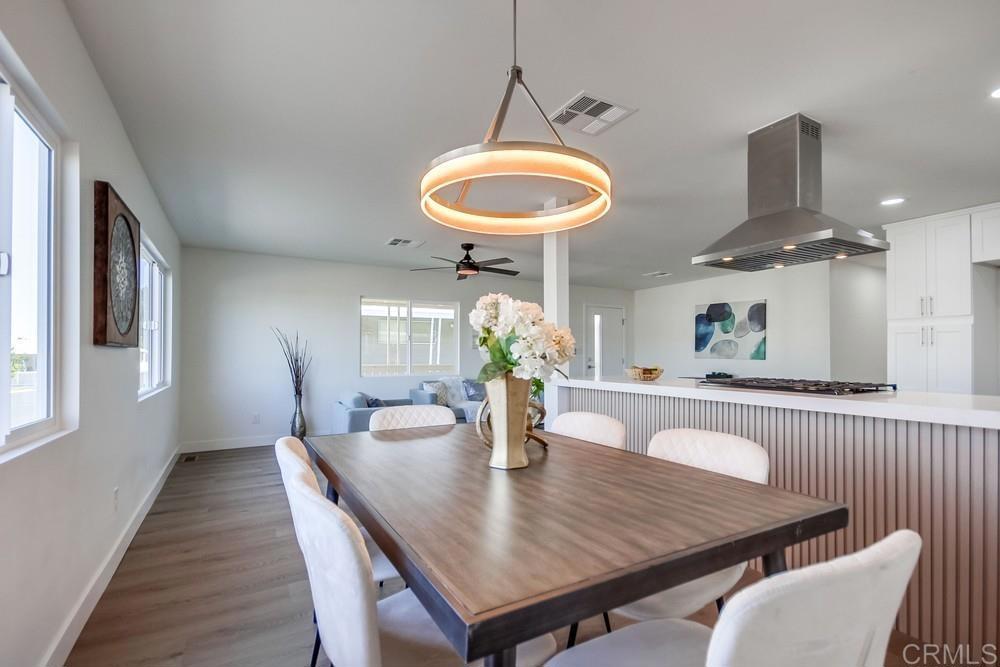 8301 Mission Gorge Road, Unit 208 Santee, CA 92071 - Photo 7 of 22 a dining room with furniture and window