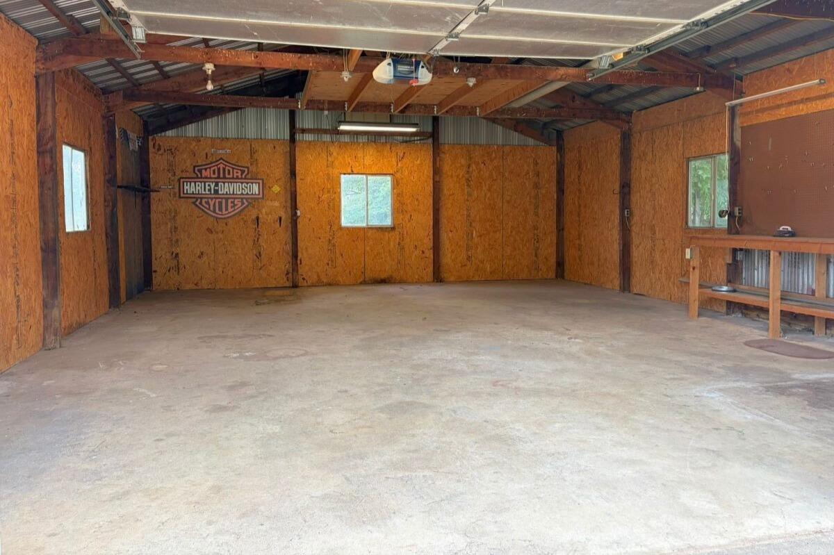 1069 Pecks Road Bedford, VA 24523 - Photo 35 of 47 Garage with concrete floor and electric