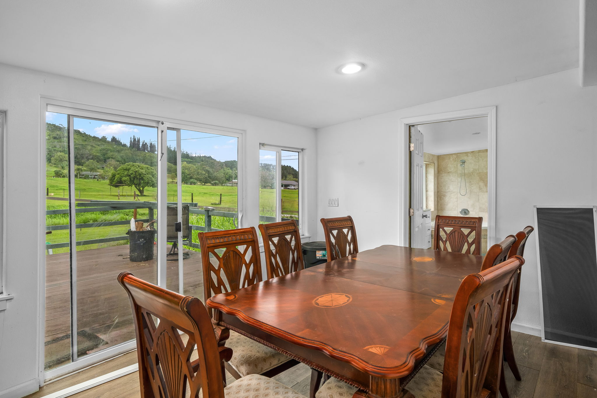 7060 Kahuna Road Kapaa, HI 96746 - Photo 9 of 25 a view of a dining room with furniture window and outside view